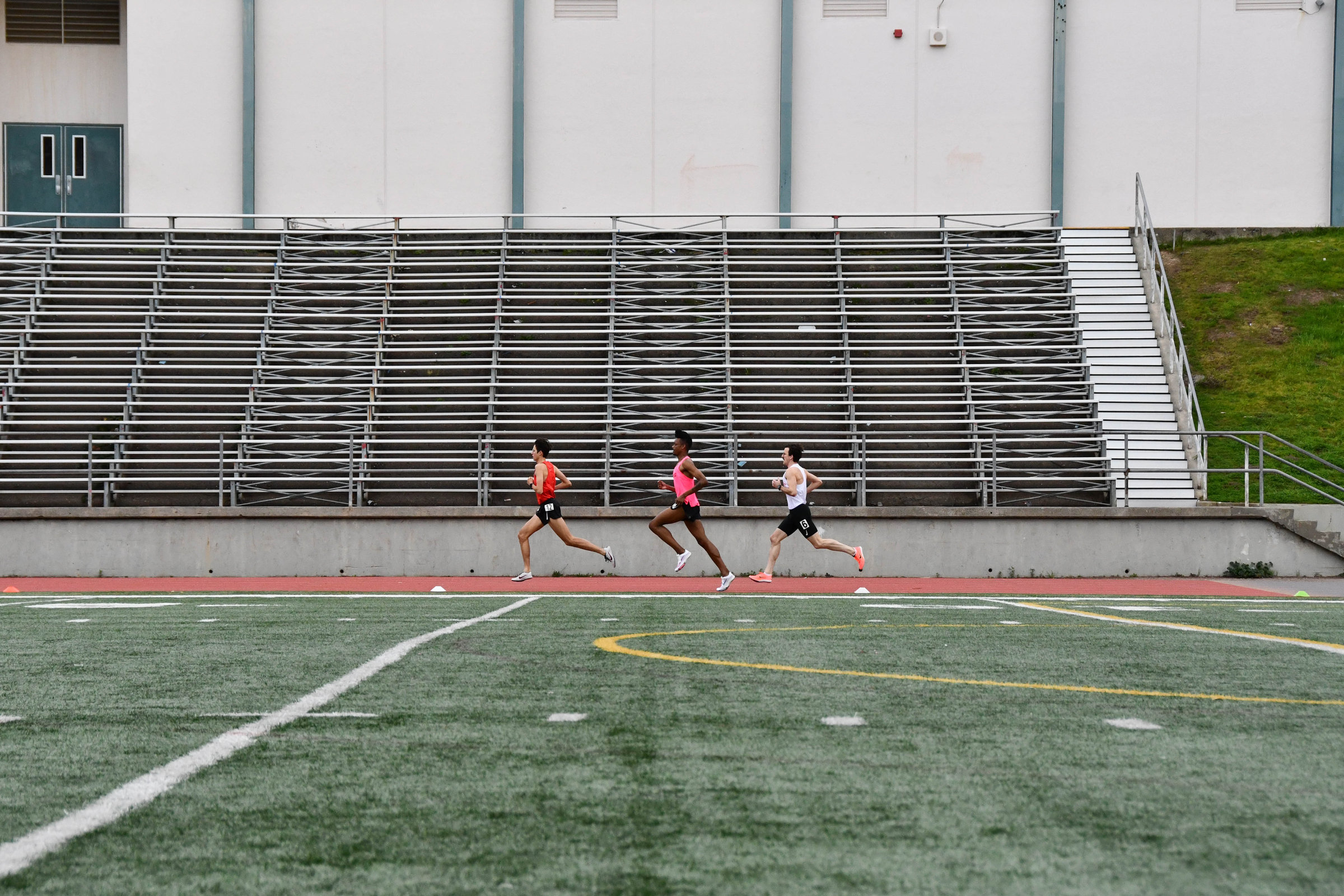 Runners racing on the track at the Winter Classic