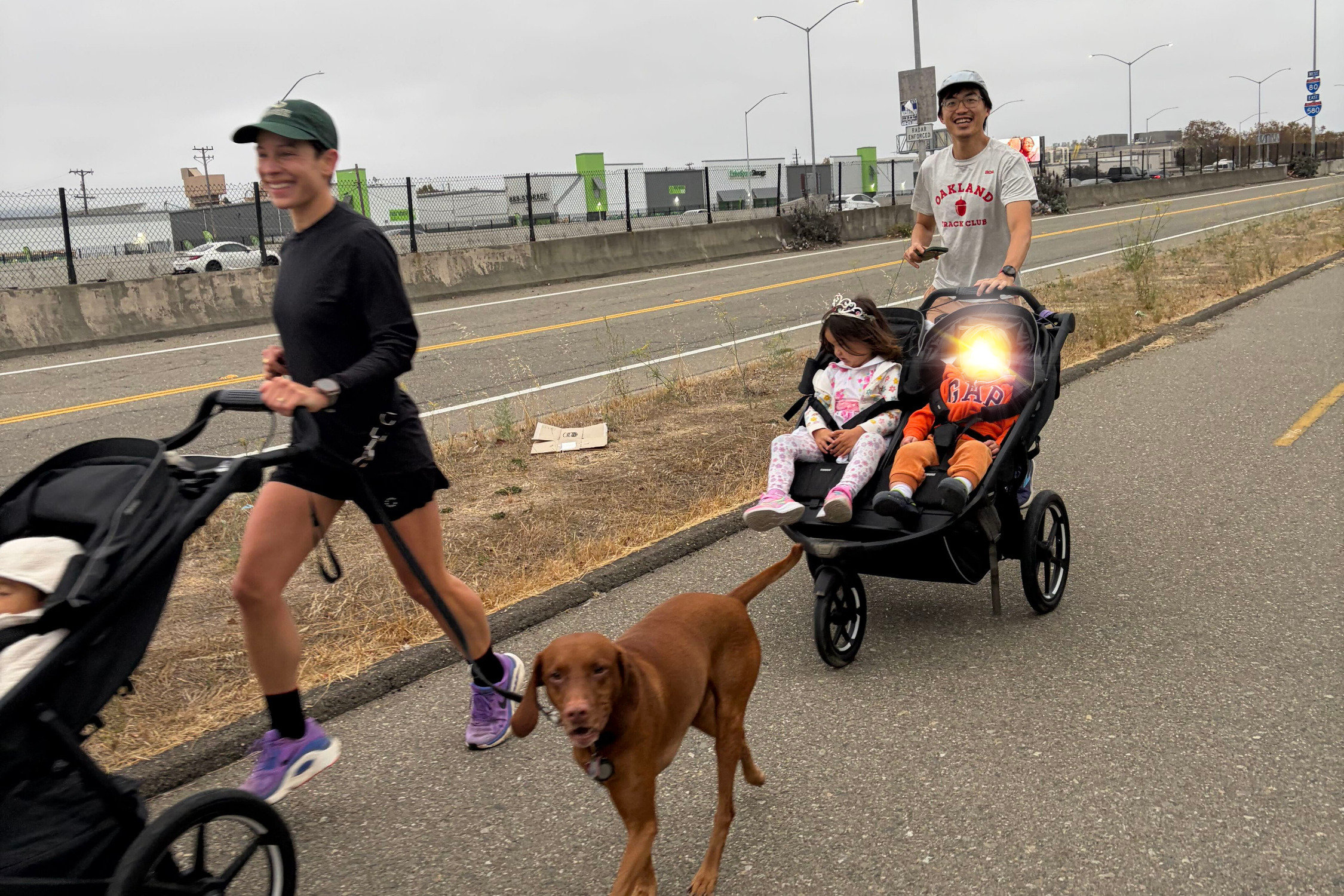 Two runners pushing strollers